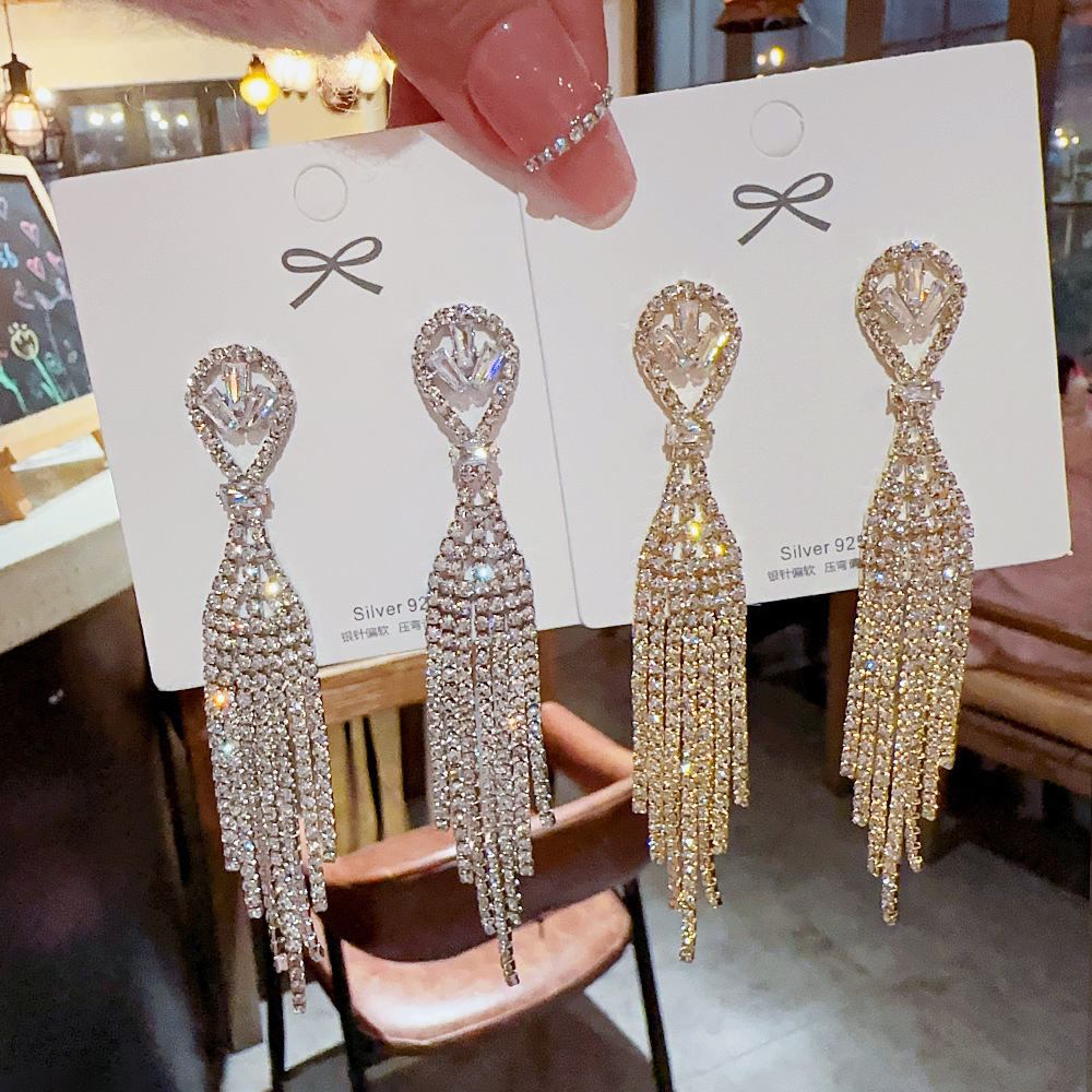 Wedding photo shoot, socialite dance party, European and American style, exaggerated and high-end, full diamond tassel earrings, accessories, light luxury earrings wholesale details Picture