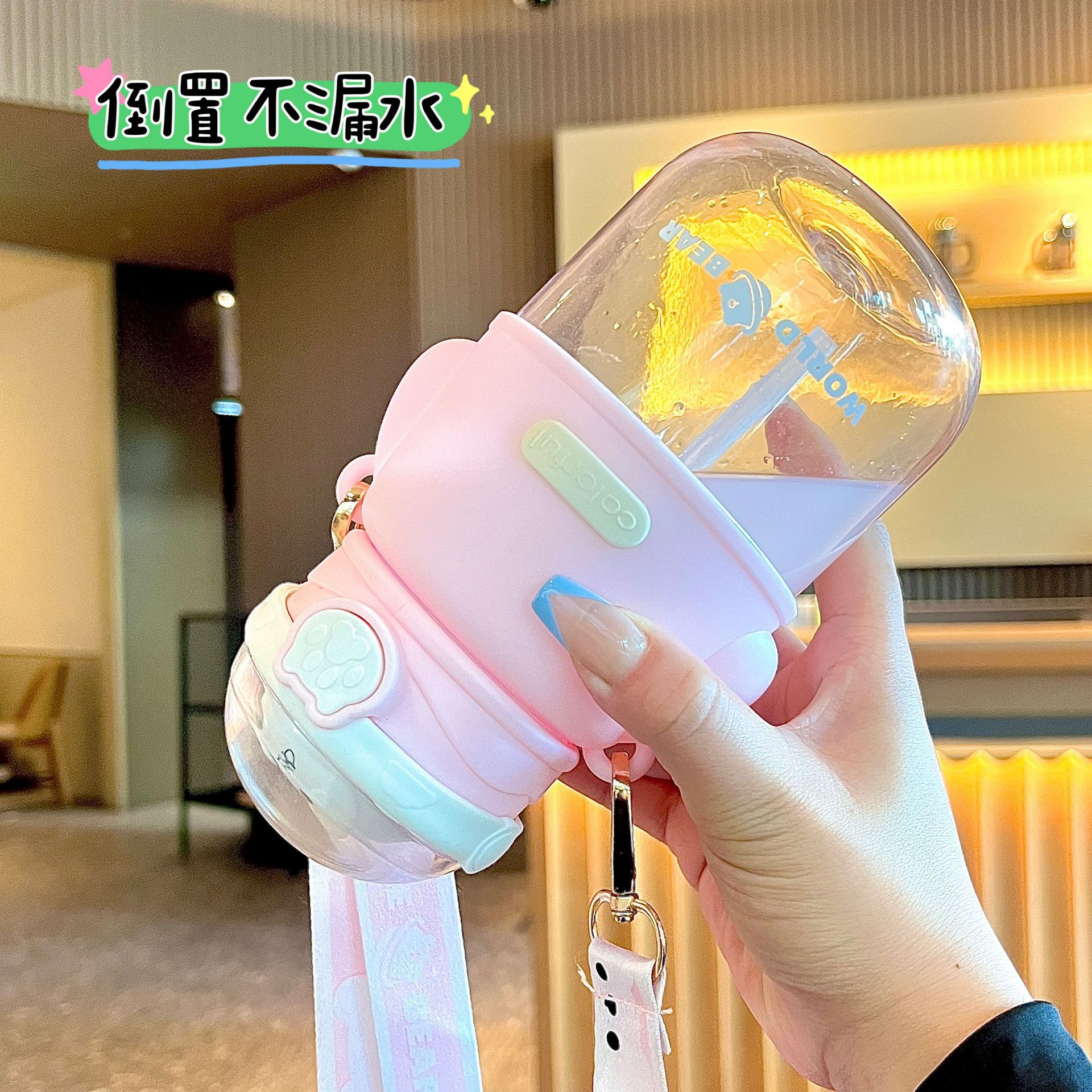 Portable large-capacity plastic cup, high appearance level student sports water cup, astronaut bear children's straw cup, shoulder strap, hand-carry Application Scenario