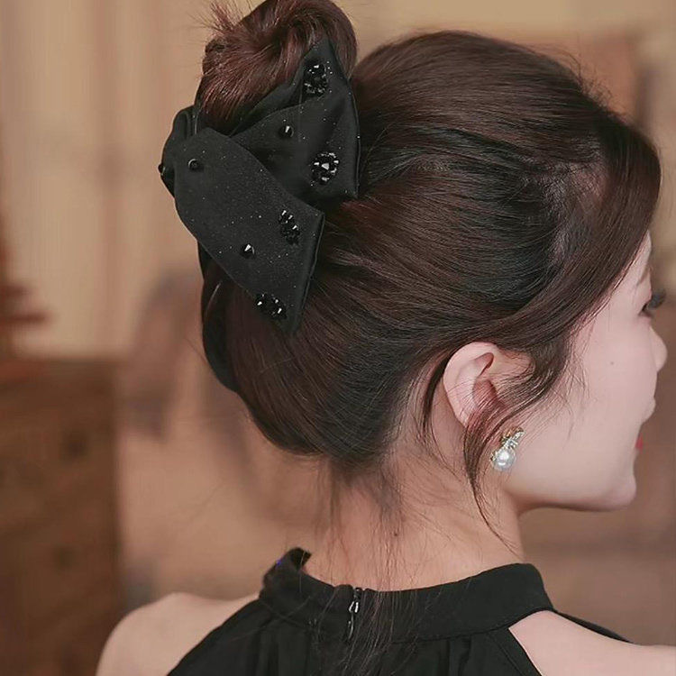 High-end black starry sky scratch-off women's new hairpin, shark clip at the back of the head, large updo hair accessory Application Scenario