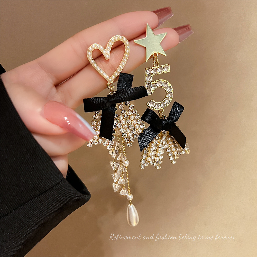 Heart-shaped bow tassels, super ethereal and dazzling earrings, women's niche design sense, high-end and elegant ear clips, ins style earrings full figure