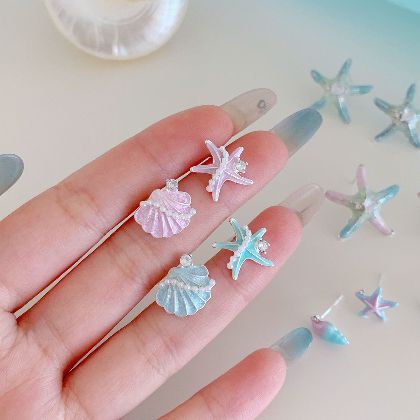 Ocean vacation style blue starfish shell stud earrings, women's silver needle, fresh and versatile design sense, exquisite and sweet earrings Application Scenario