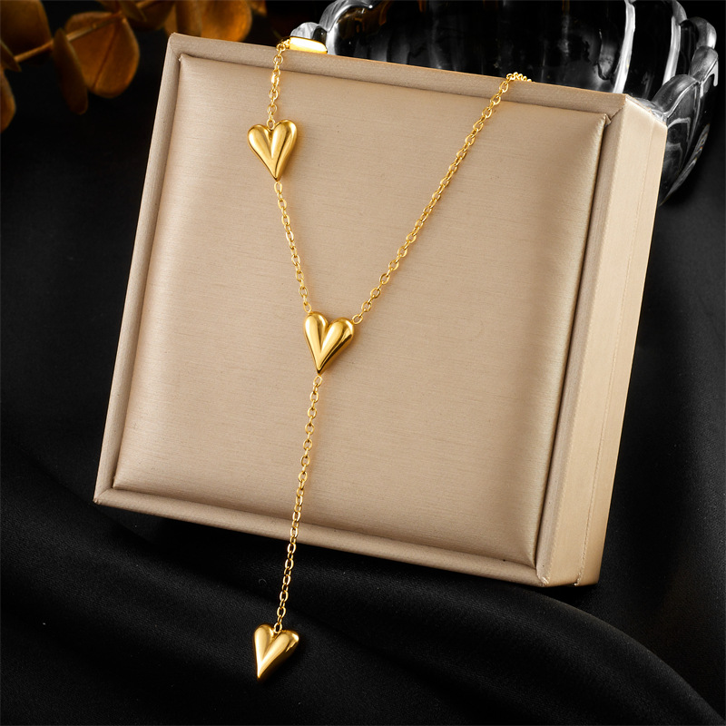 Korean style, simple and fashionable design, gold-plated smooth surface, heart-shaped tassel pendant, chain, stainless steel jewelry necklace full figure
