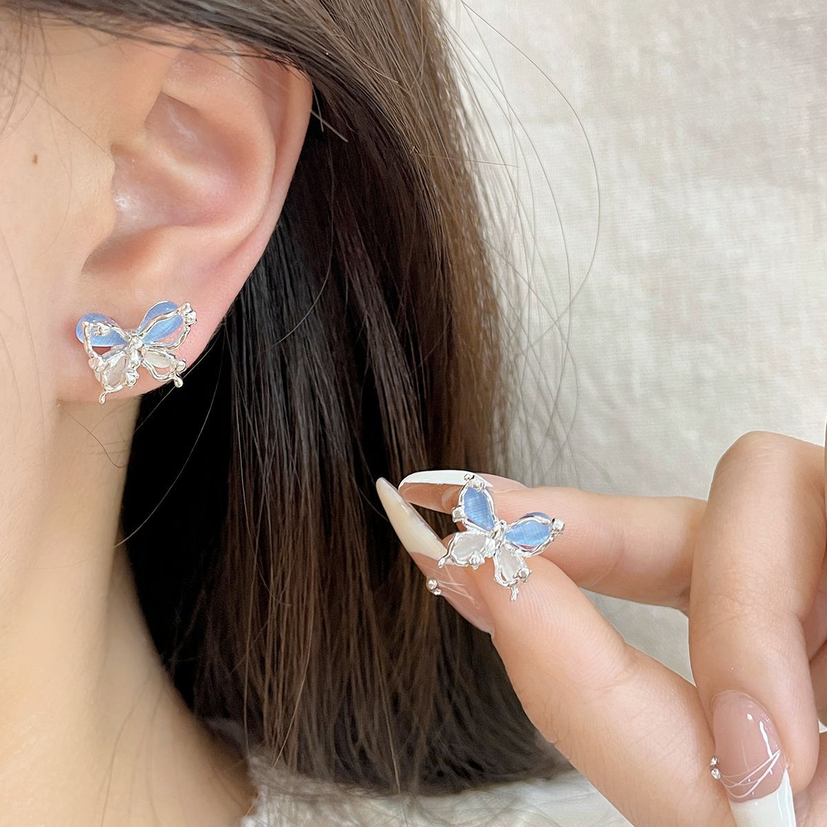 Spring and summer pink cat's eye stone double-layer butterfly stud earrings for women in an ins style, light luxury, three-dimensional, simple and ethereal sweet earrings details Picture