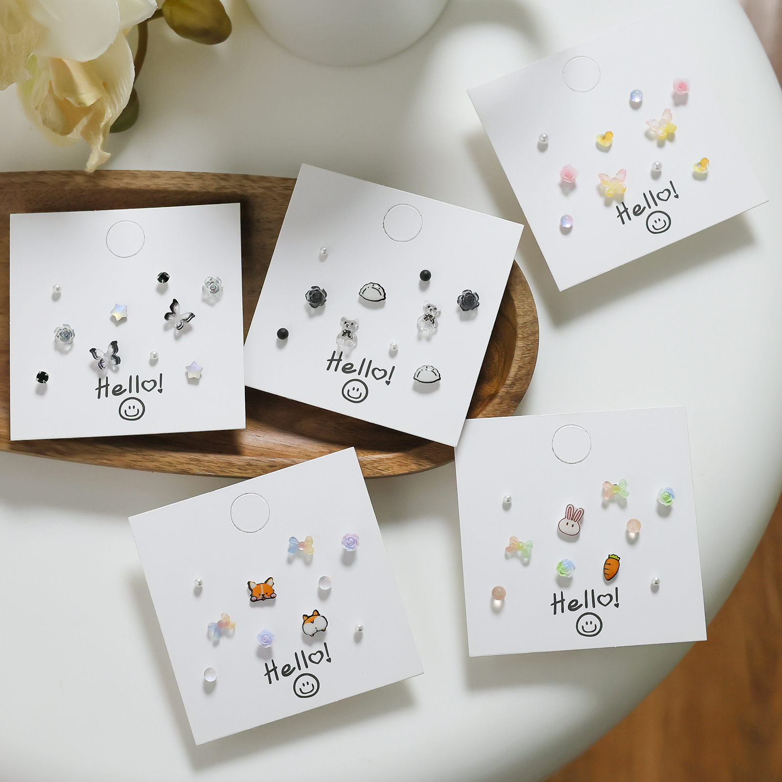 s925 Silver Needle flower resin stud earrings are versatile, cute, student sweet and cool trend earrings, simple and small earrings wholesale full figure