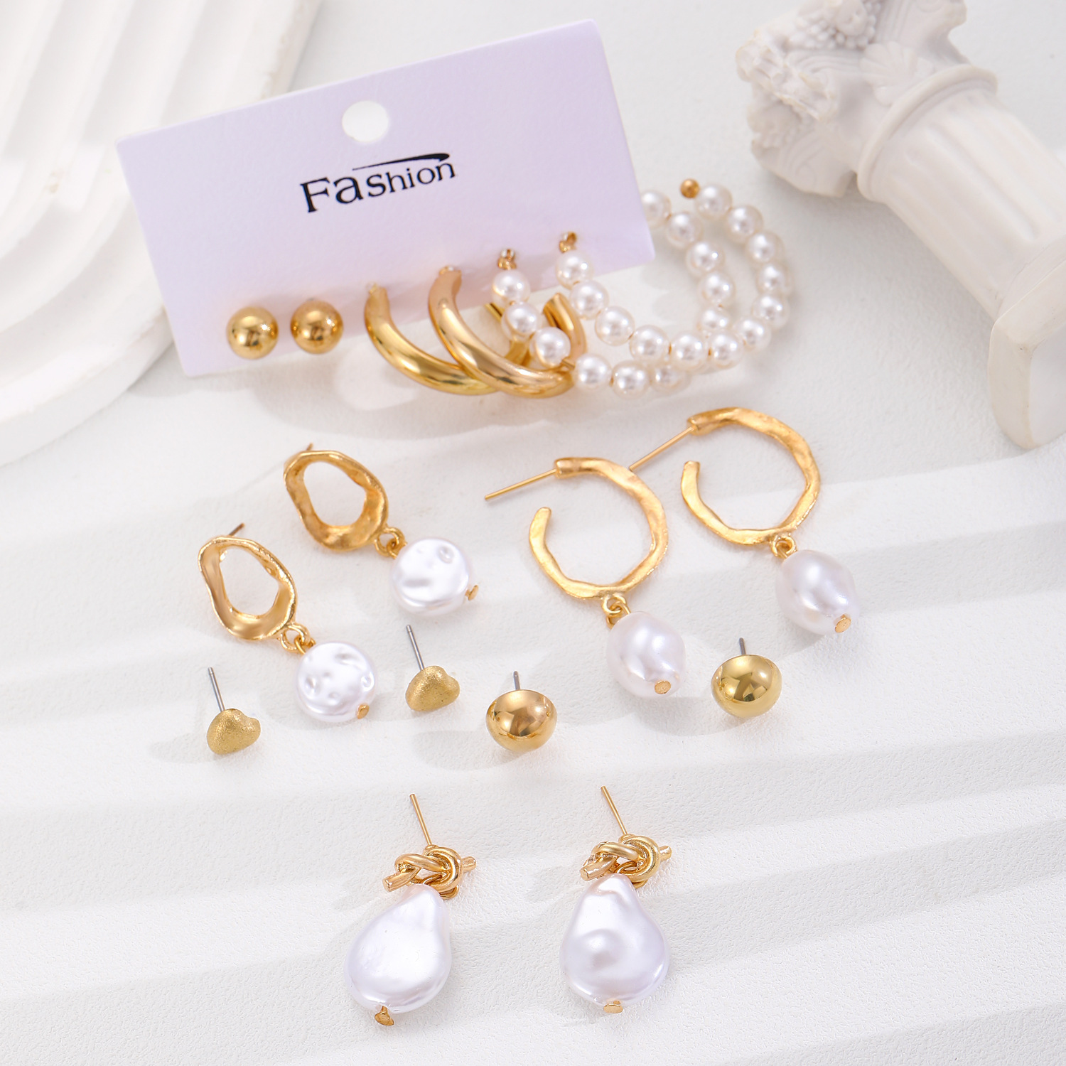 Niche design sense, simple imitation pearl earrings, women's retro French light luxury, irregular-shaped pearl ear loops and ear rings accessories Application Scenario
