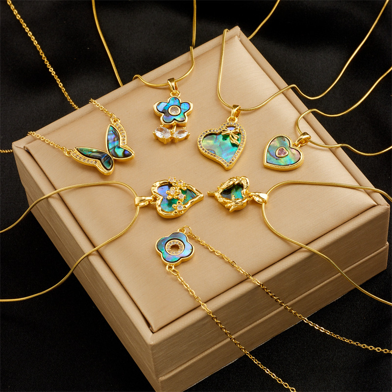 Fashionable and niche design, high-end, light luxury, versatile titanium steel heart-shaped small flower bow, diamond-encrusted pendant chain necklace full figure