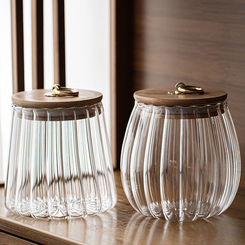 Wholesale vertical pattern transparent glass sealed jars, household kitchen multi-functional storage jars, tea, snack and candy storage jars full figure