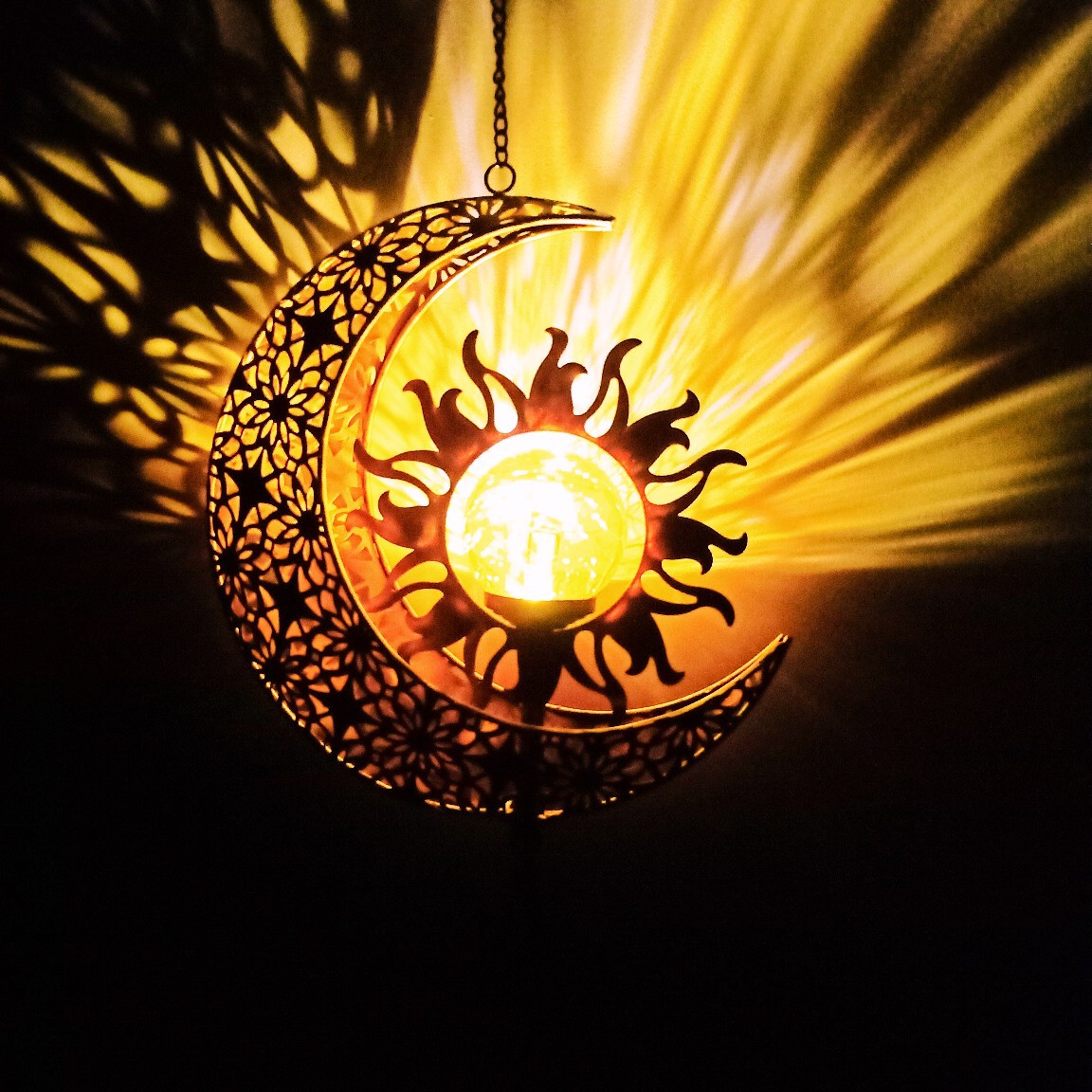 Amazon's new ironwork led solar energy sun moon wind bell pendant is in stock at the factory full figure