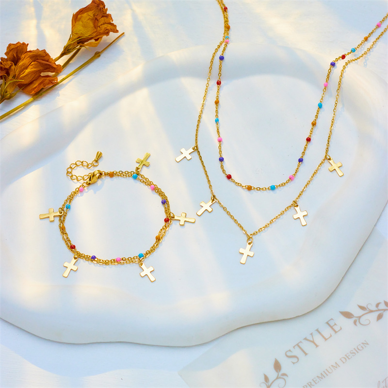 European and American fashion, creativity, individuality, versatility, ethnic style mixed color rice bead chain cross titanium steel pendant jewelry set full figure