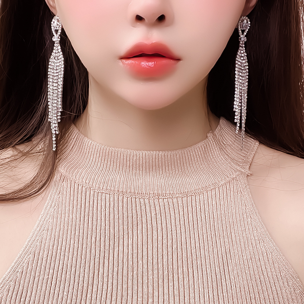 Wedding photo shoot, socialite dance party, European and American style, exaggerated and high-end, full diamond tassel earrings, accessories, light luxury earrings wholesale full figure