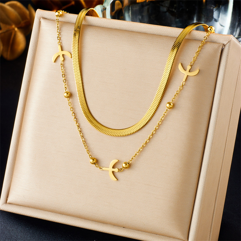 A fashionable, simple and niche design double-layered gold-plated titanium steel chain swallow accessory necklace full figure