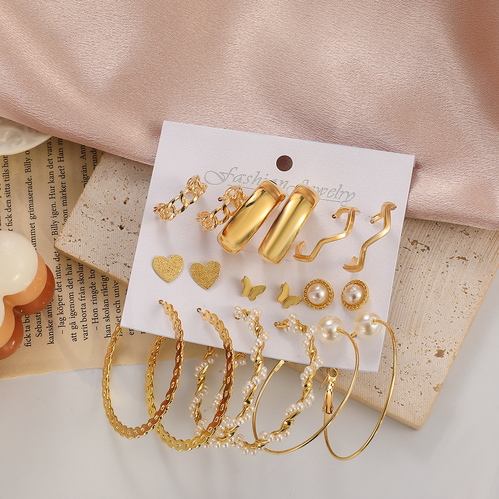 New cross-border exaggerated imitation pearl earrings 9-piece set, European and American ins retro alloy geometric ear ring set earrings Application Scenario