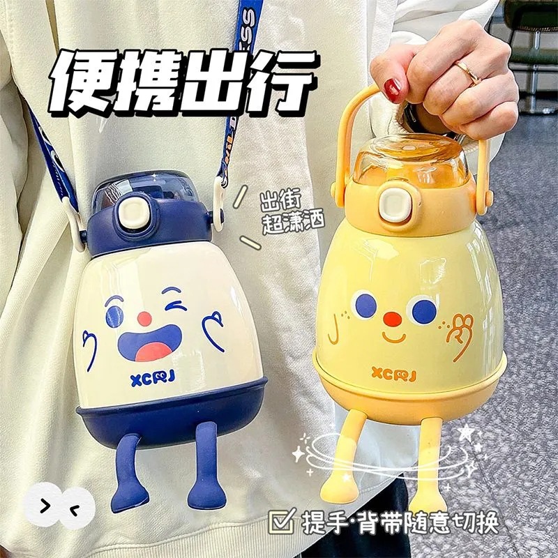 Wholesale of cute big-belted insulated cups, large-capacity cartoon children's water bottles, portable slanted stainless steel straw cups for gifting full figure