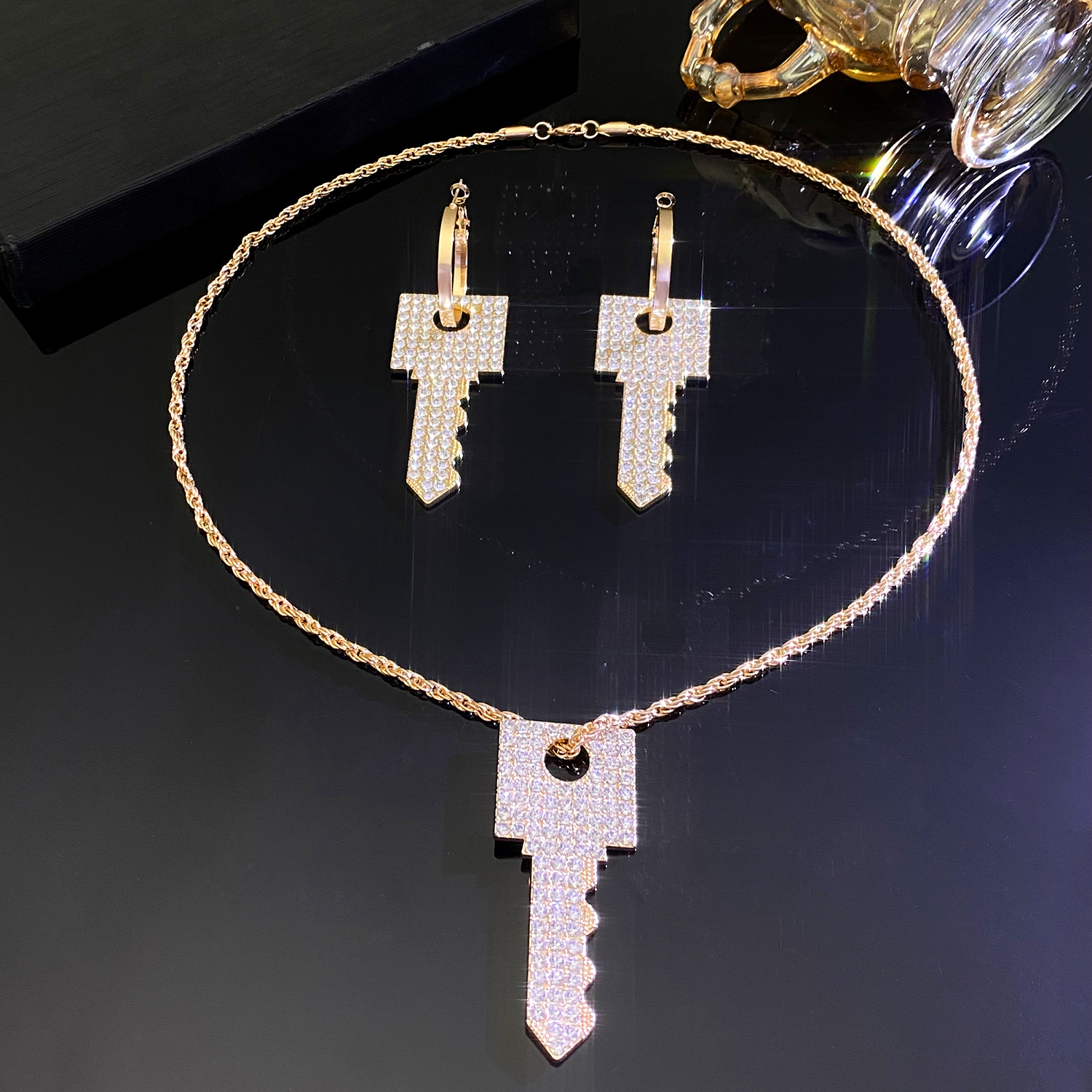 European and American cross-border fashion and creative ins metal design sense, full diamond light luxury key pendant earrings necklace women's jewelry Application Scenario
