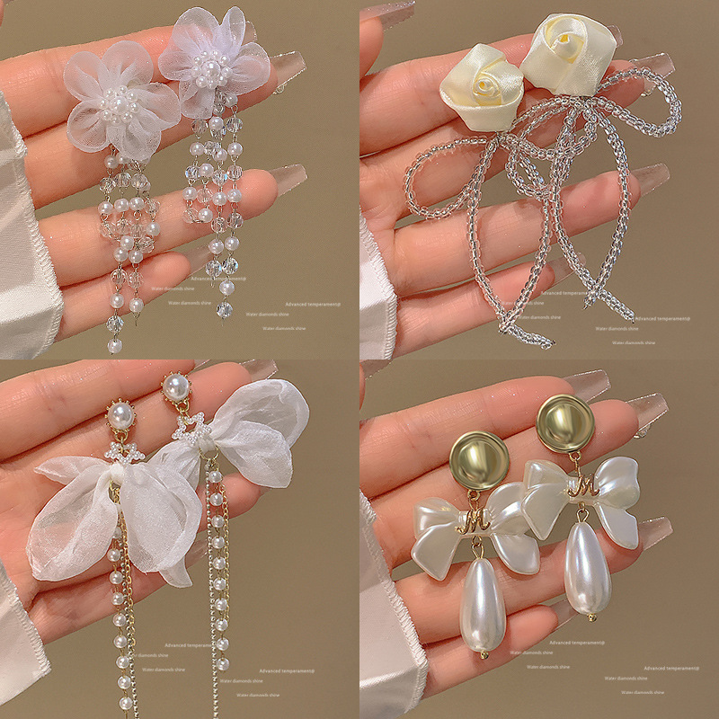French retro long tassel earrings for women, high-end, individual and fashionable stud earrings, 2025 new niche design earrings full figure