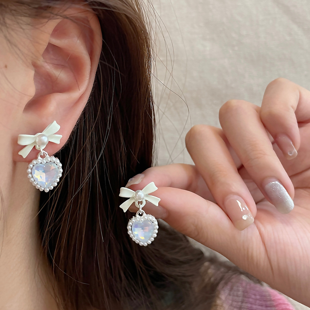 Summer new style sea salt transparent white bow Mermaid Girl heart earrings for women, exquisite and versatile, sweet and elegant earrings details Picture