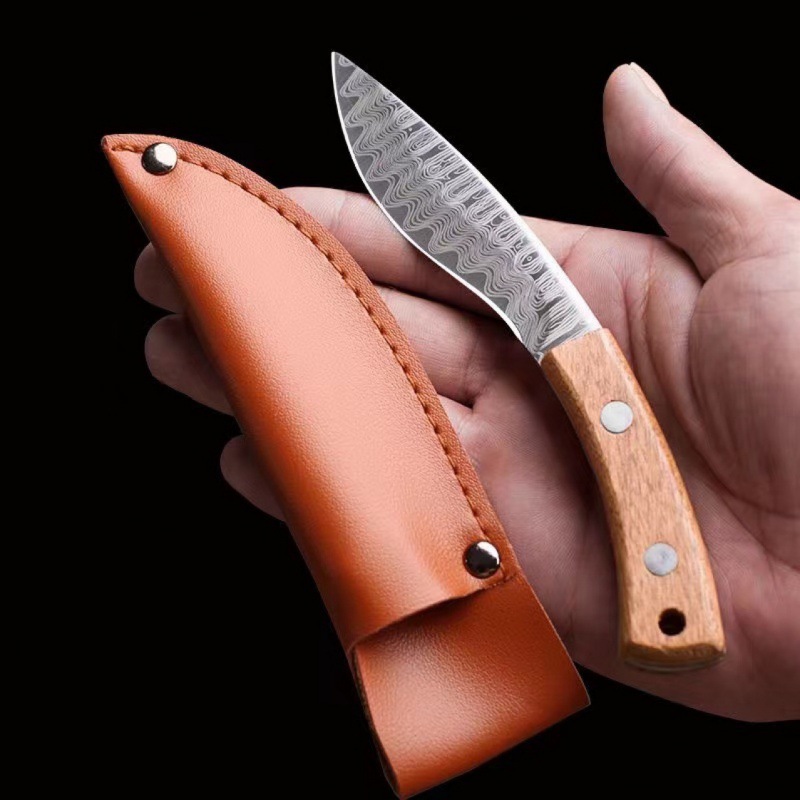 A Damask patterned hand-forged meat knife with a leather case is available for barbecuing, camping, outdoor use, and fruit knives full figure