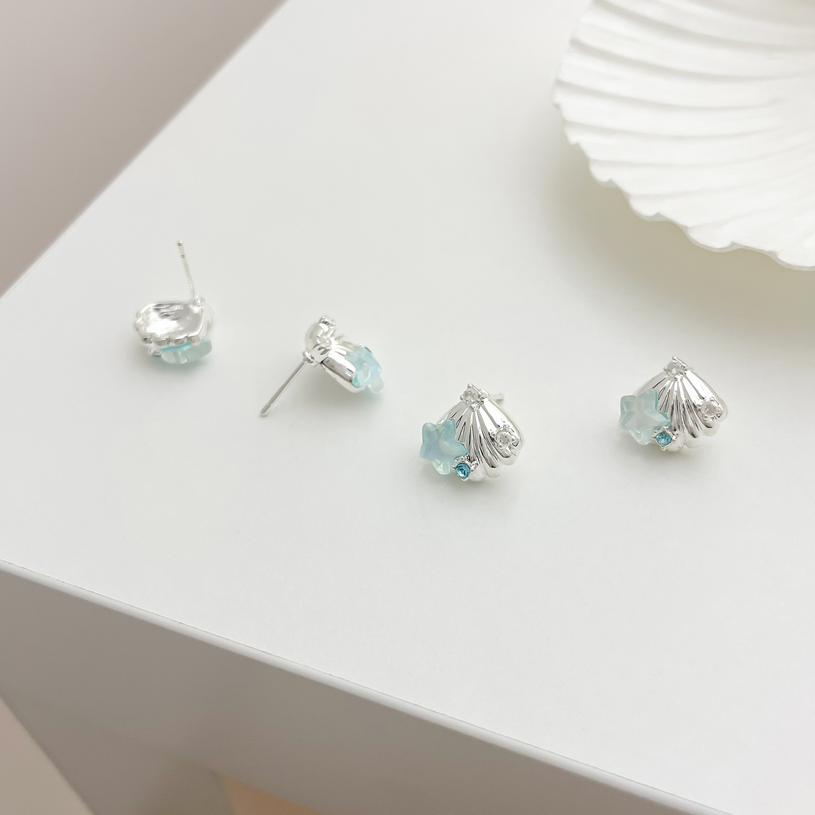 Summer new arrivals: Sea blue shell starfish stud earrings, women's silver needle bestsellers, small vacation earrings, exquisite earrings wholesale Application Scenario