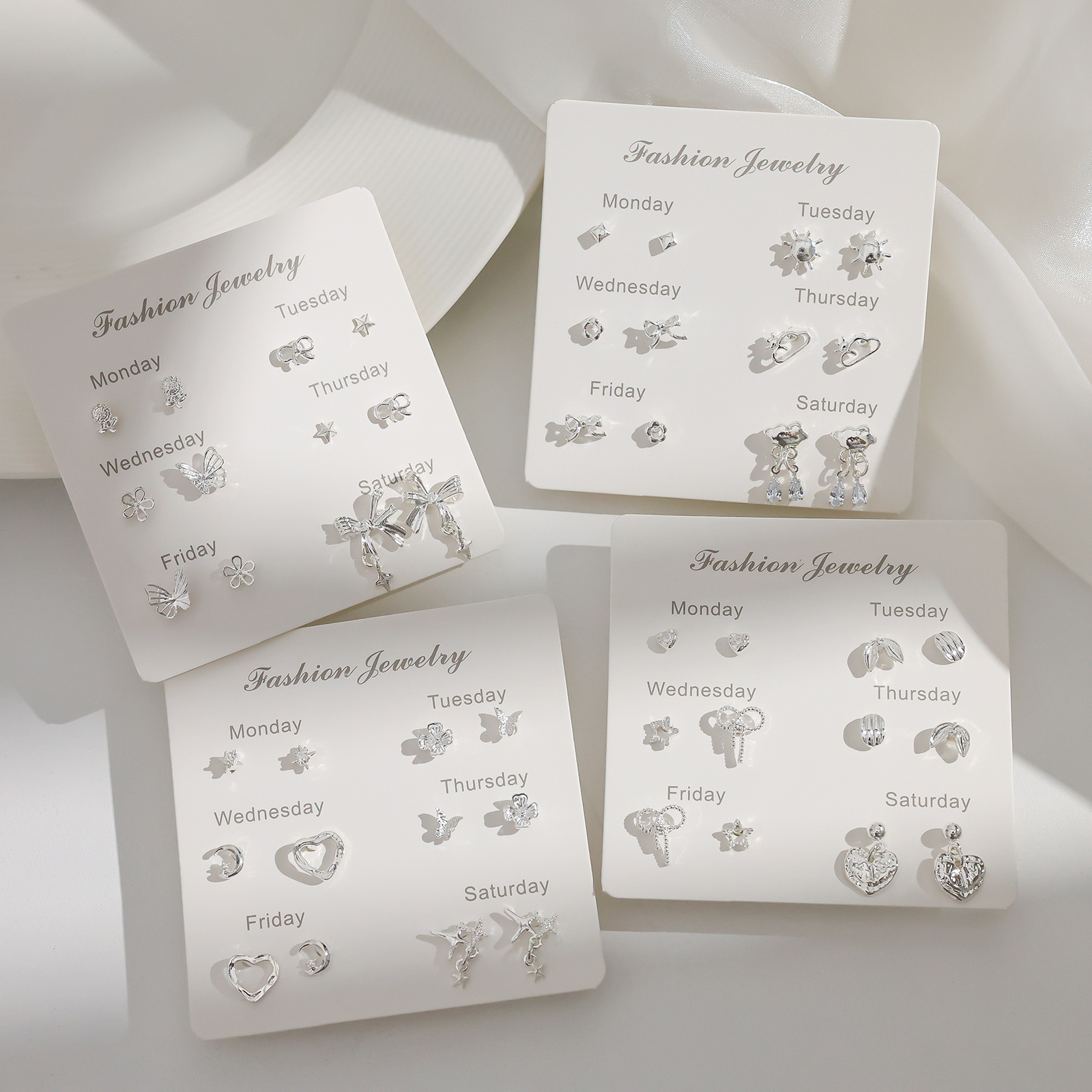 Simple silver small stud set for women, with a geometric design, is exquisite and versatile. Wholesale of one-week earrings for students details Picture