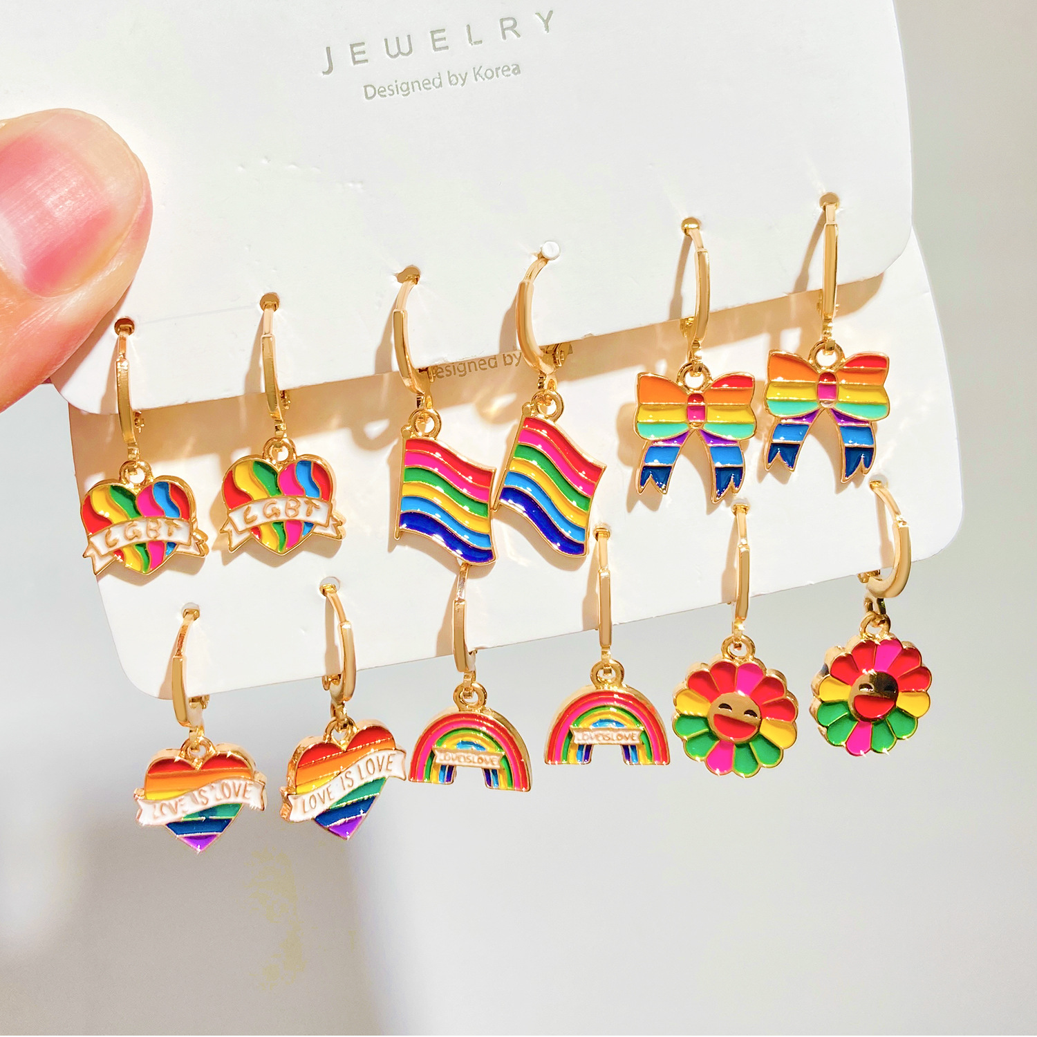 Colorful oil-dripping earrings set, European and American ins cloud flag bow heart earrings, cross-border women's accessories full figure