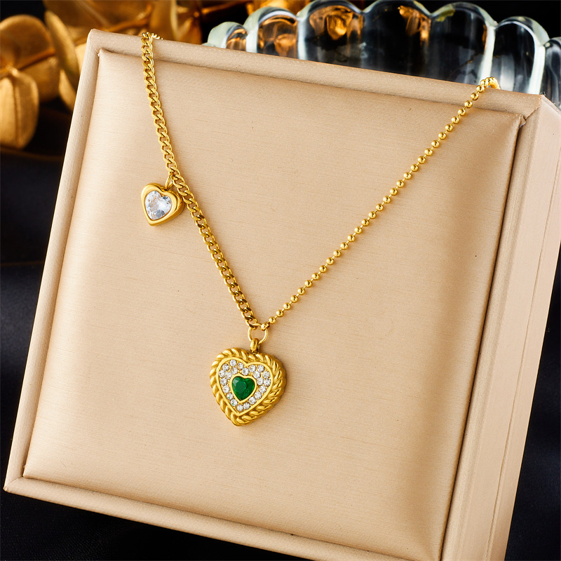 A fashionable, niche and high-end retro asymmetrical titanium steel gold-plated chain with diamond-encrusted heart pendant accessory necklace full figure