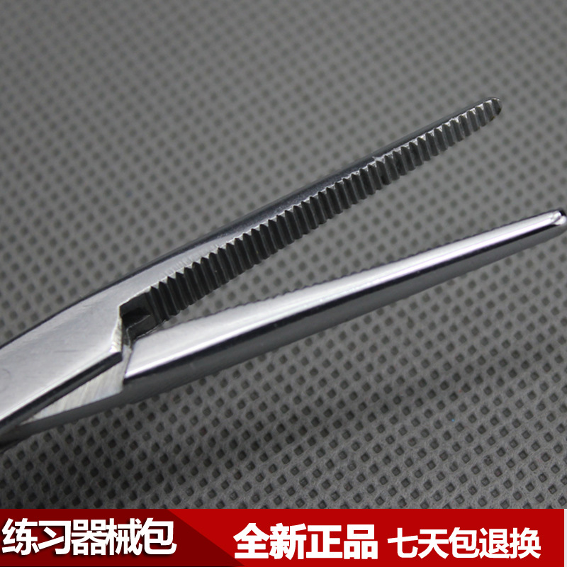 Medical students practice surgical debridement and suturing. Surgical instruments include skin modules, suturing needles, thread cutters, and needle holders details Picture