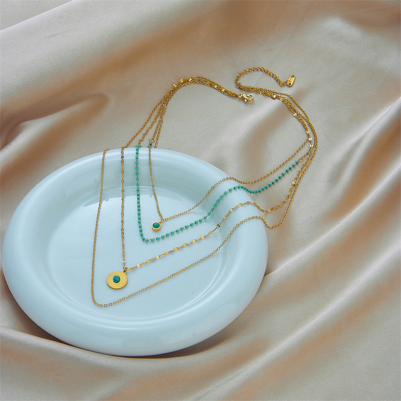 European and American cross-border niche design creative and personalized multi-layer irregular titanium steel round plate turquoise pendant chain necklace Application Scenario