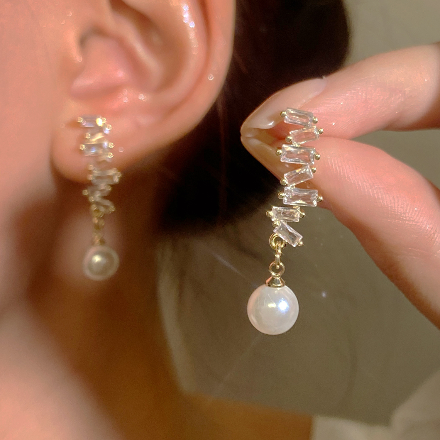 European and American inS-style copper-inlaid zircon pearl earrings, French light luxury creative design, elegant earrings, internet-famous earrings full figure