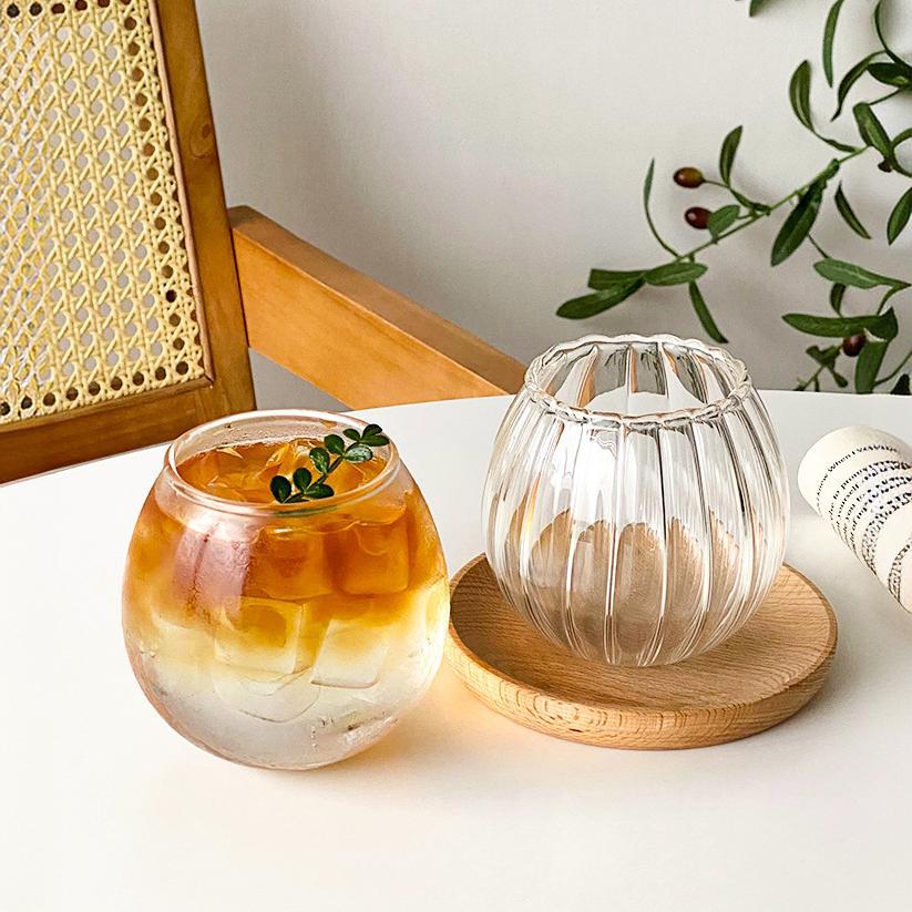 Minimalist style creative round iced American coffee cup, popular restaurant high appearance level soda water sparkling cup, beverage cup details Picture
