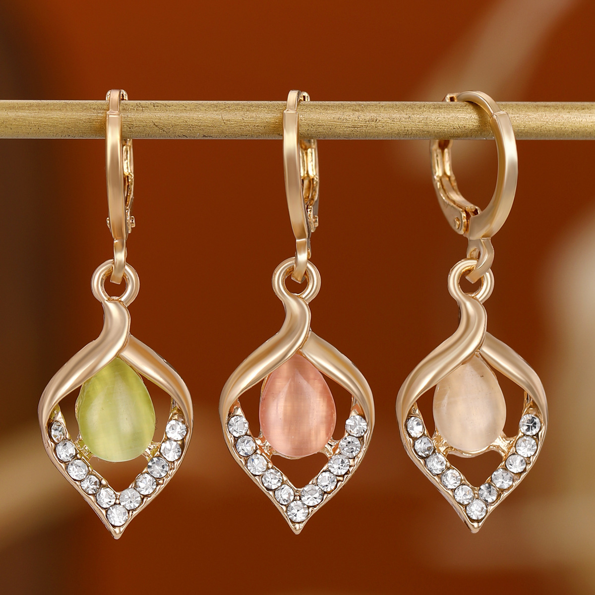 Angel Eye Cat's Eye Stone Earrings, French light luxury creative diamond-encrusted water drop earrings, European and American style diamond-shaped earrings trend Application Scenario