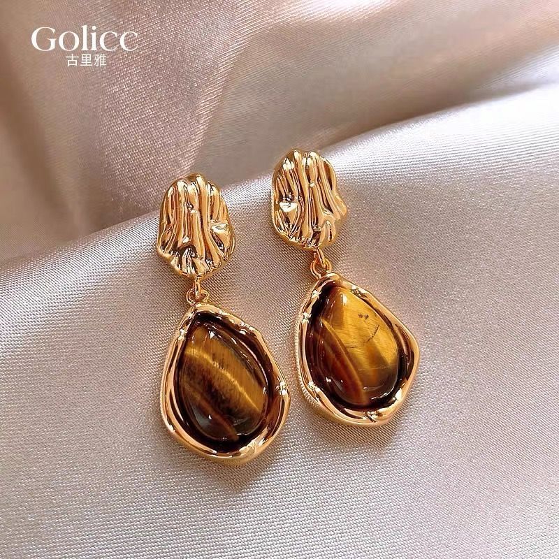 Hong Kong-style unique tiger's eye stone earrings, retro Maillard earrings, women's niche design sense, high-end stud earrings, light luxury, versatile Specification drawing