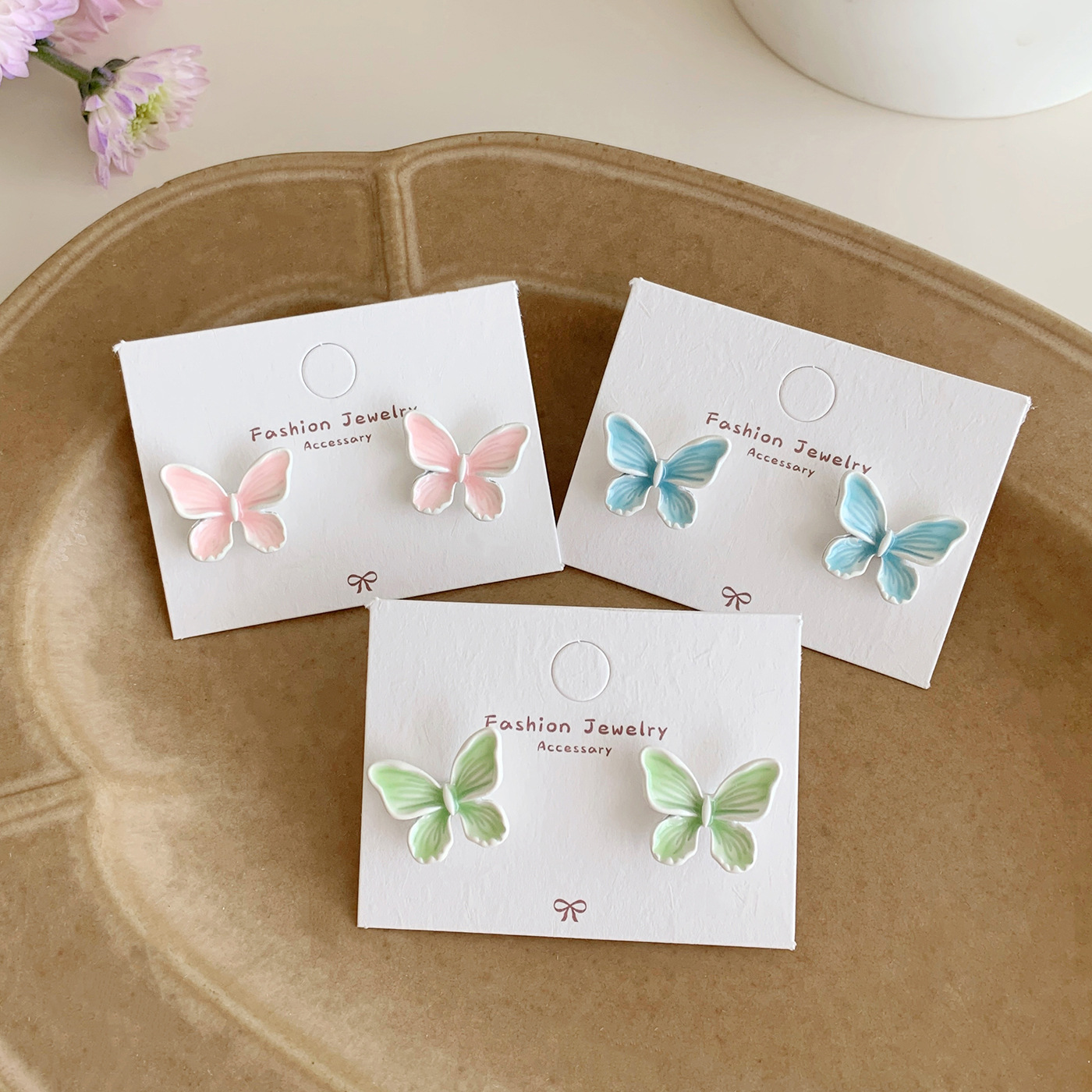 Summer sweet candy-colored oil painting butterfly earrings, women's silver needle, exquisite design sense, ins style, versatile and super fairy earrings Application Scenario