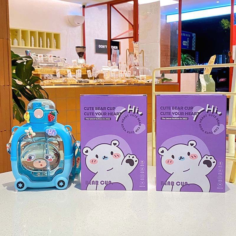 New summer children's water cup with large capacity, cartoon plastic strap, high appearance level, portable magic water bottle bear Application Scenario