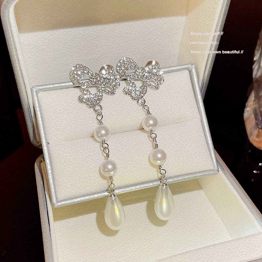 European and American exaggerated long full-diamond irregular tassel earrings, light luxury and high-end, trendy bestsellers, individual and elegant earrings full figure