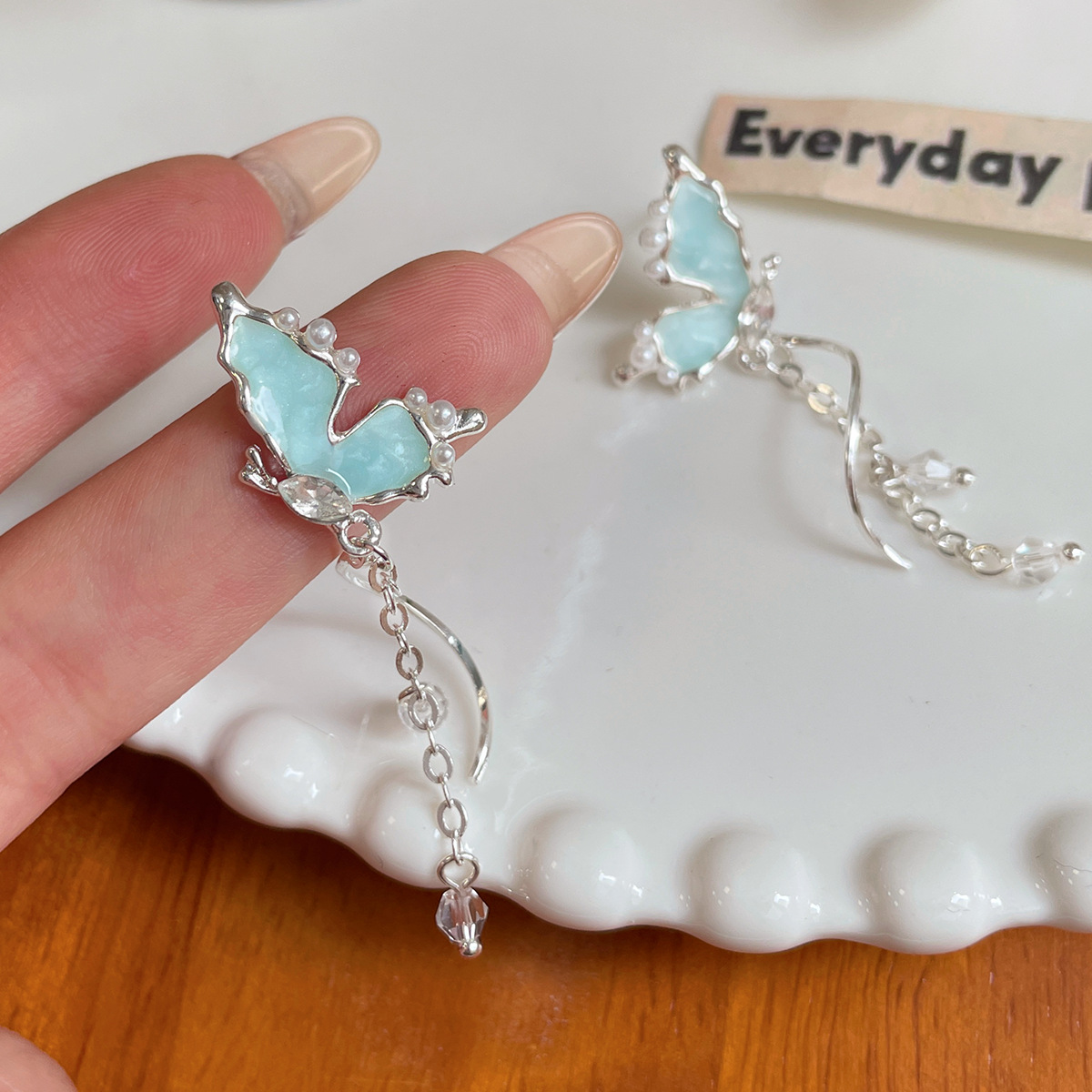 Ocean blue butterfly tassel long earrings, women's silver needle, summer unique, niche, light luxury, ethereal and high-end earrings Application Scenario