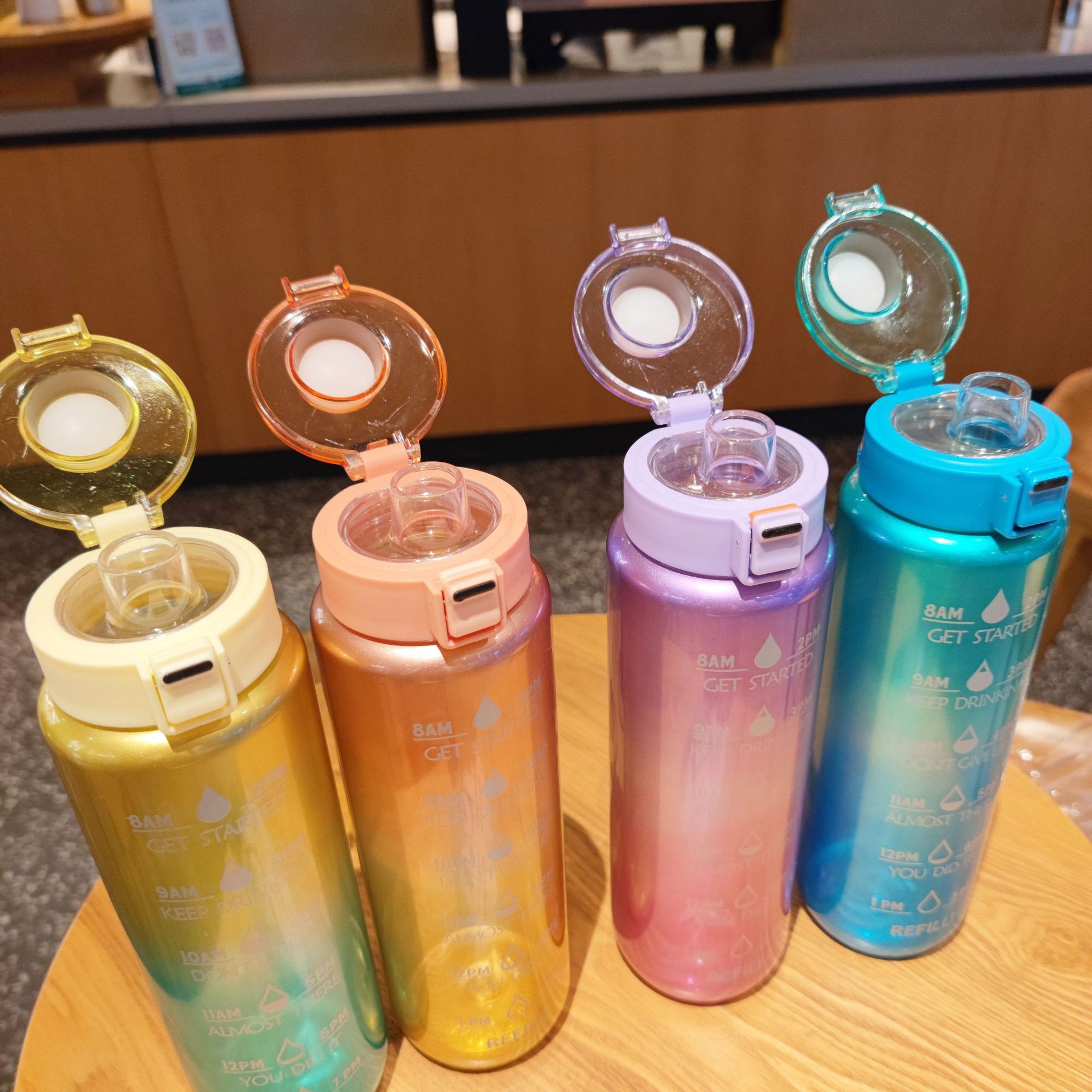 Wholesale Pearl Light fashionable plastic water cups, portable drawstring outdoor sports water bottles, student male and female direct drinking water bottles full figure
