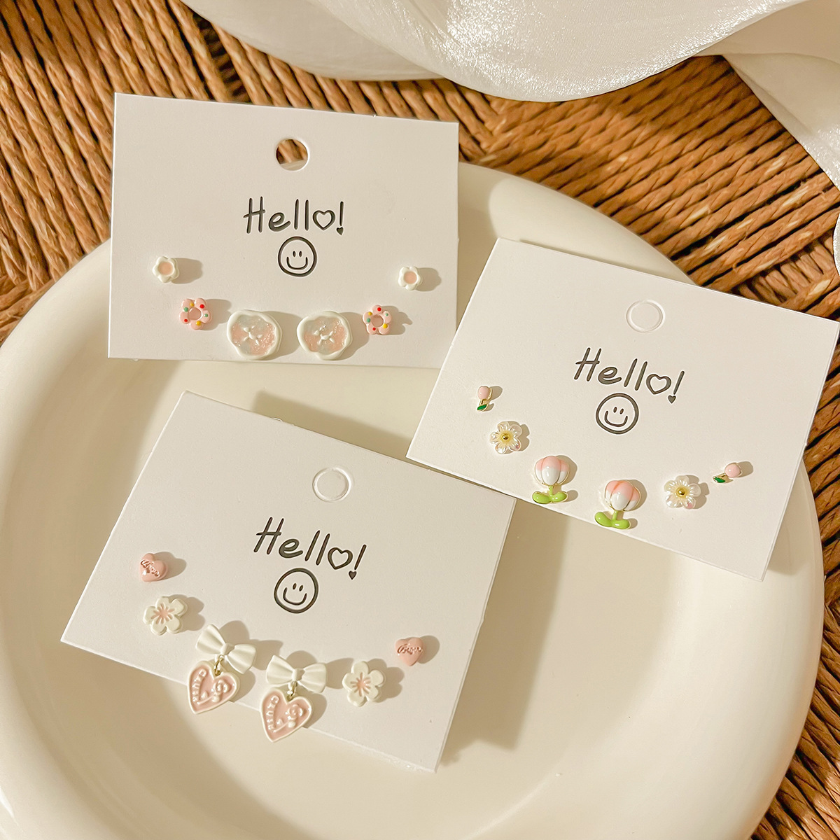 Summer new sweet women's silver needle ear studs, ear bone studs, pink cute flowers, simple and versatile, exquisite ear studs wholesale full figure