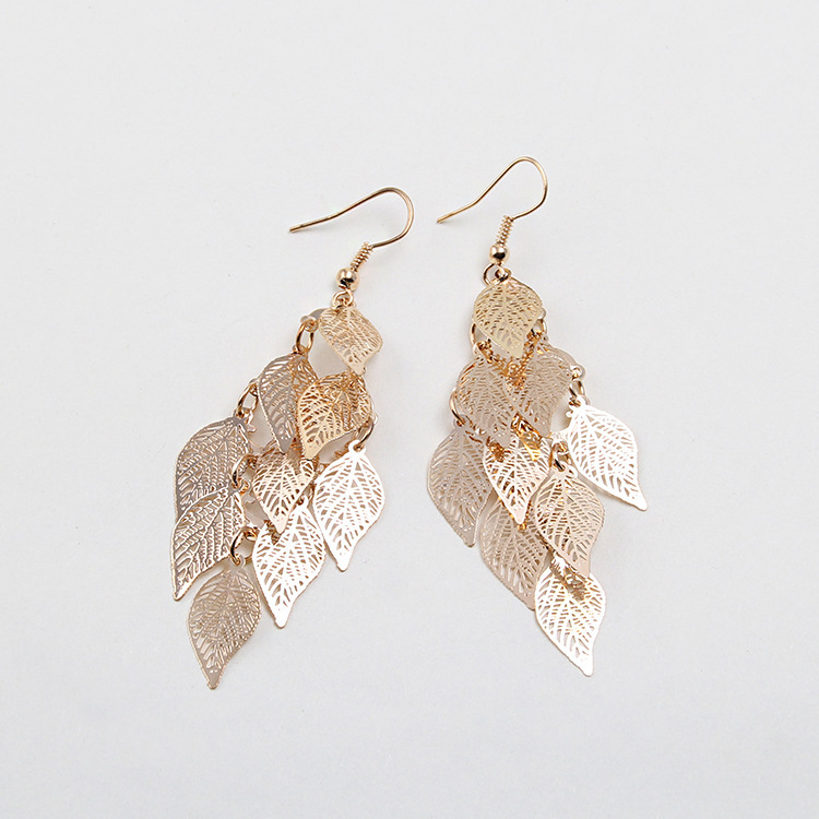 Japanese and Korean forest-themed cold style earrings for women's summer, fresh, simple and fashionable, colorful hollowed-out leaf ear hook earrings Application Scenario