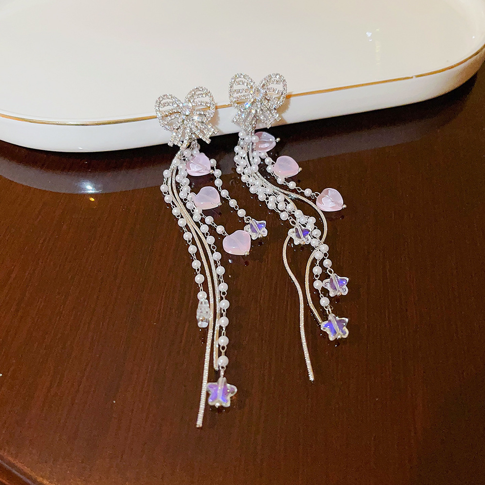 Luxurious bow pearl tassel earrings for ladies, high-end heart-shaped earrings for autumn and winter, sweet and cool style, star stud earrings details Picture