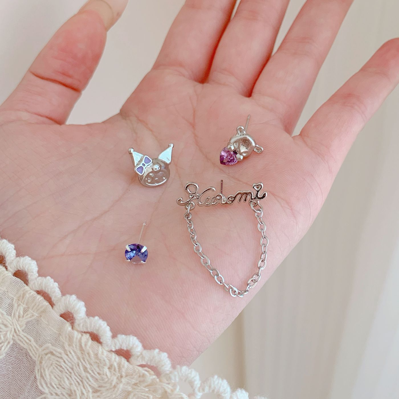 Sweet cartoon little devil, exquisite purple diamond rabbit stud earrings, female silver needle, niche design, fun and childlike student earrings Application Scenario