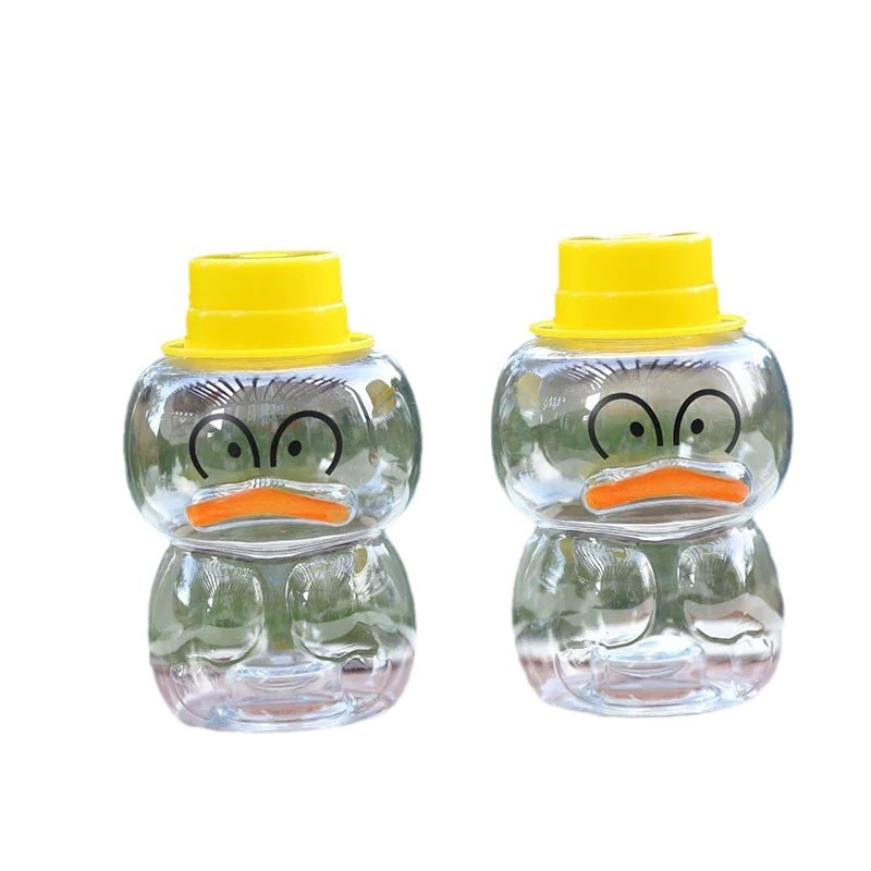 The manufacturer is selling a new type of cute summer little yellow duck juice drink milk tea cup, a popular PET cold drink cup with a lid Item Picture