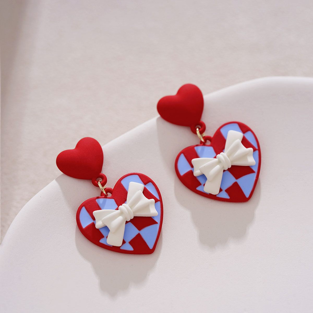 Red heart-shaped diamond pattern earrings, a unique and gentle touch. White bow stud earrings with a distinctive design. Valentine's Day women's earrings Application Scenario