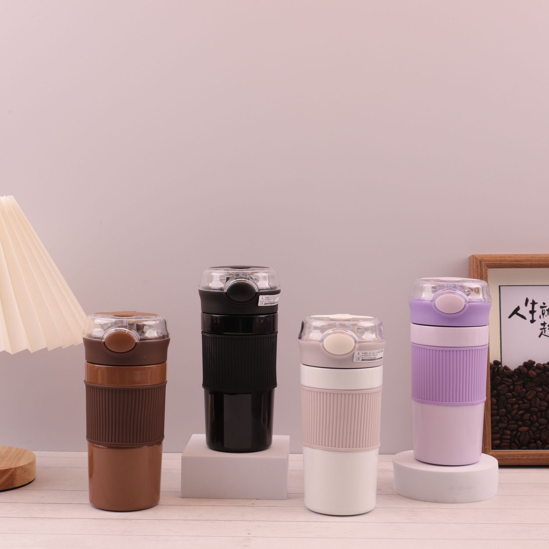Wholesale of 304 stainless steel insulated cups, silicone sleeves, pop-up straws, coffee cups and outdoor portable water cups from manufacturers full figure