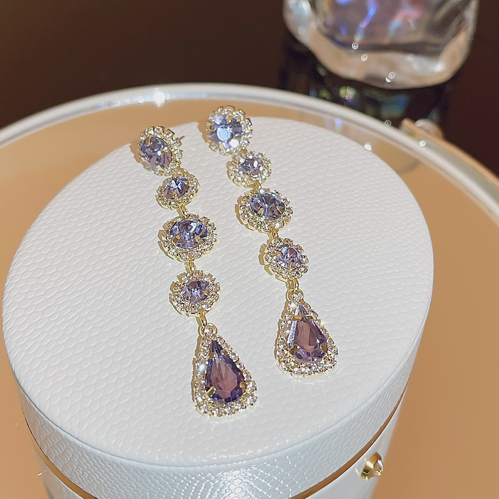 2024 New stylish geometric long tassel earrings for autumn and winter, high-end purple teardrop earrings for women wholesale full figure