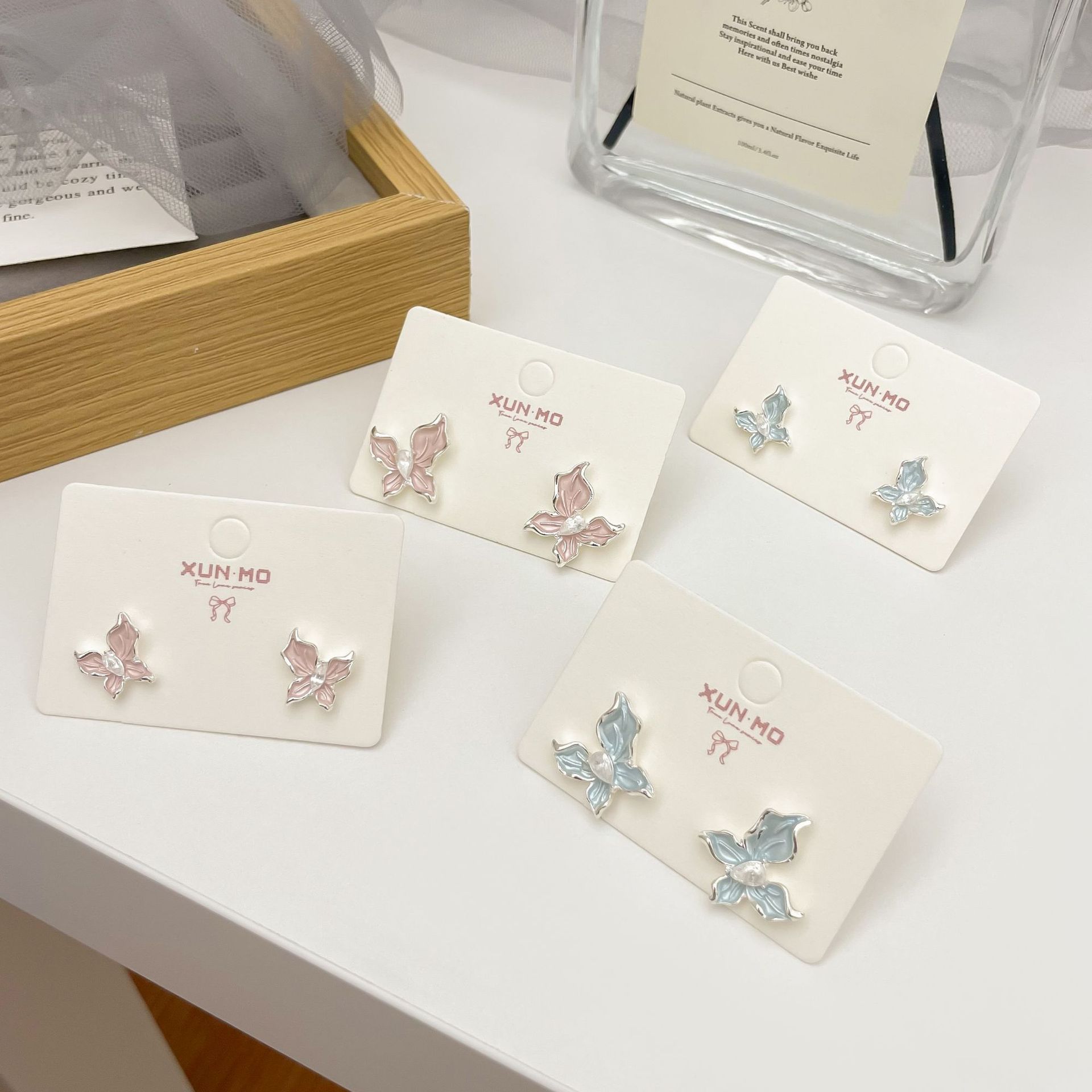 Butterfly earrings, a niche design with a light luxury and high-end feel, are fashionable and exquisite. Zirconia silver needle stud earrings are new spring and summer collection for women details Picture