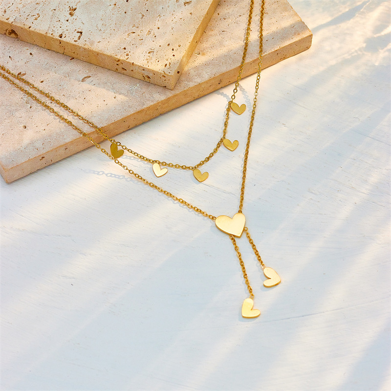 Korean-style simple, fashionable and niche design, oil-dripping glossy heart-shaped tassel irregular double-layer titanium steel necklace details Picture