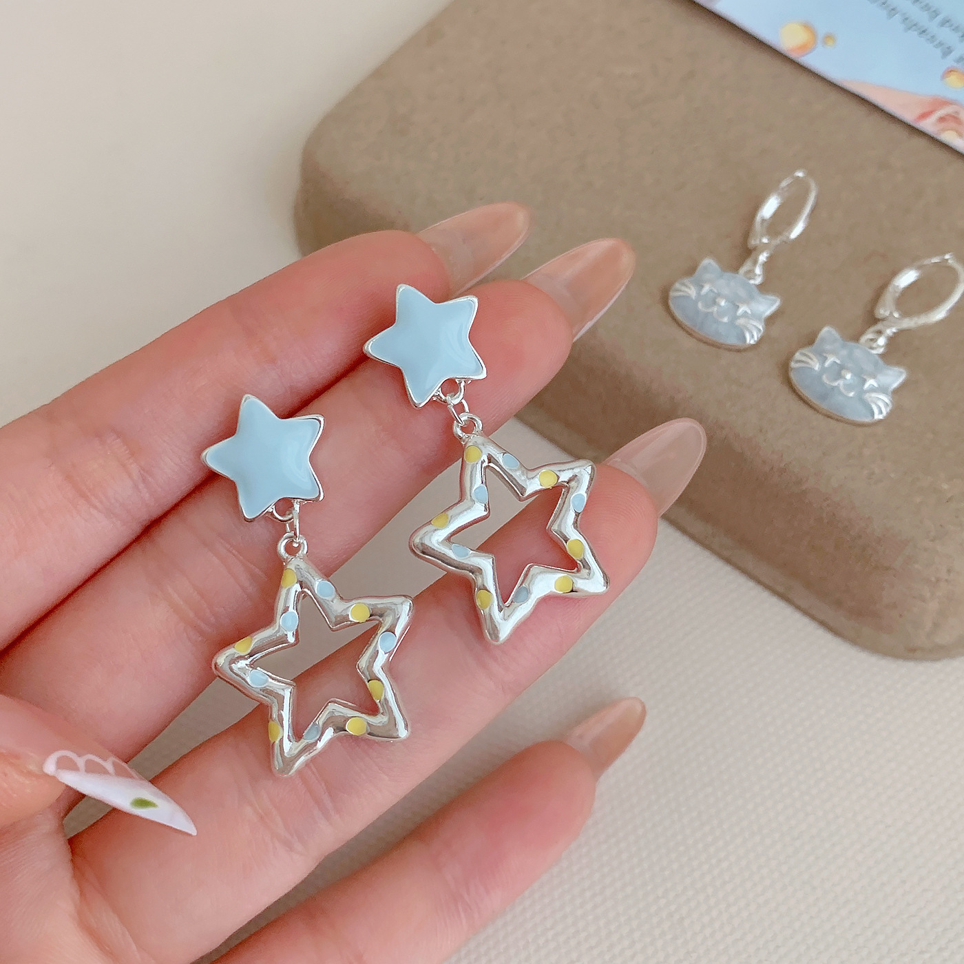 Summer cute oil-dripping blue cat ear earrings, silver needle cartoon Korean version creative and fresh five-pointed star ear studs details Picture