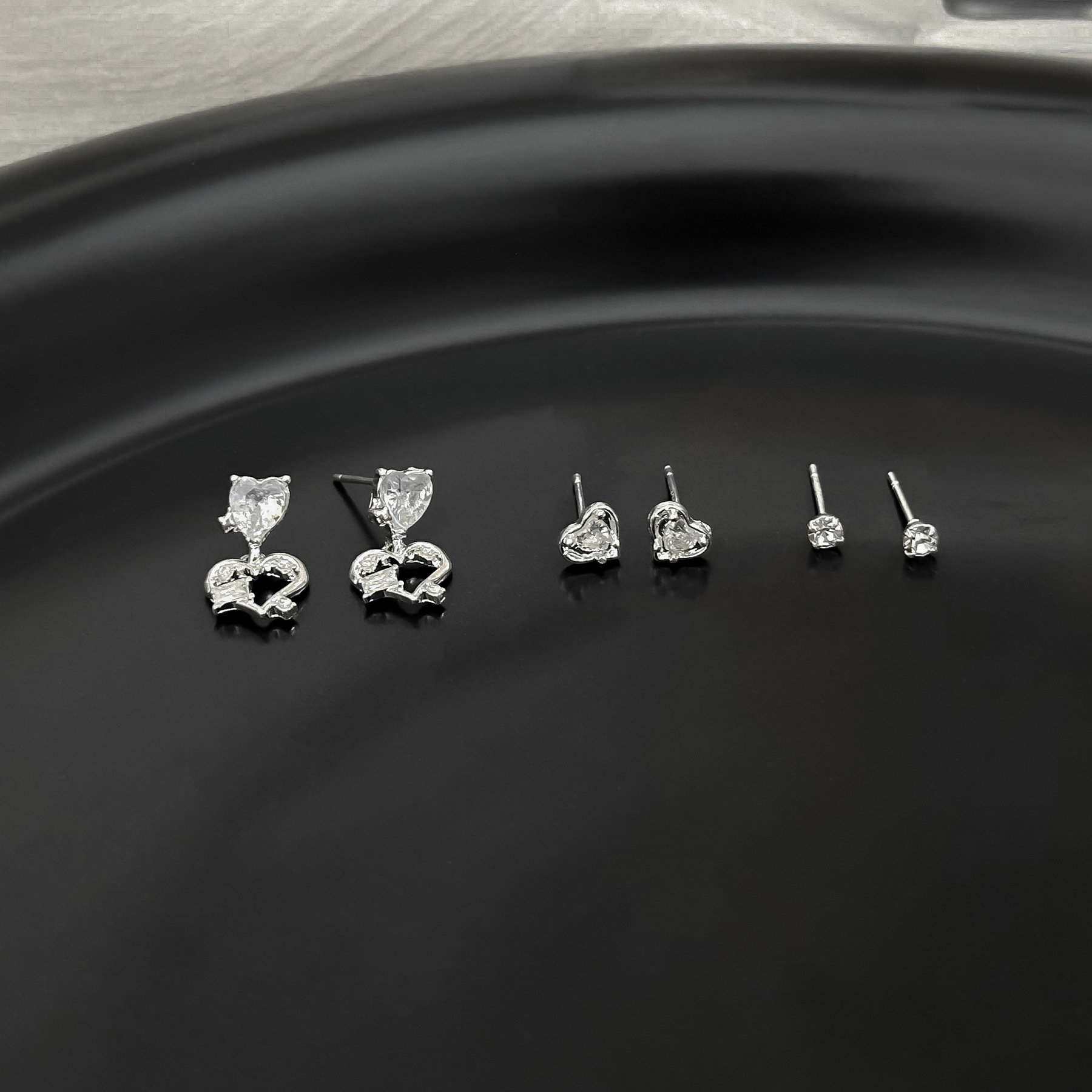 Silver needle stud earrings set, exquisite, light luxury, niche design sense, women's zircon bow heart-shaped sweet earrings wholesale Application Scenario