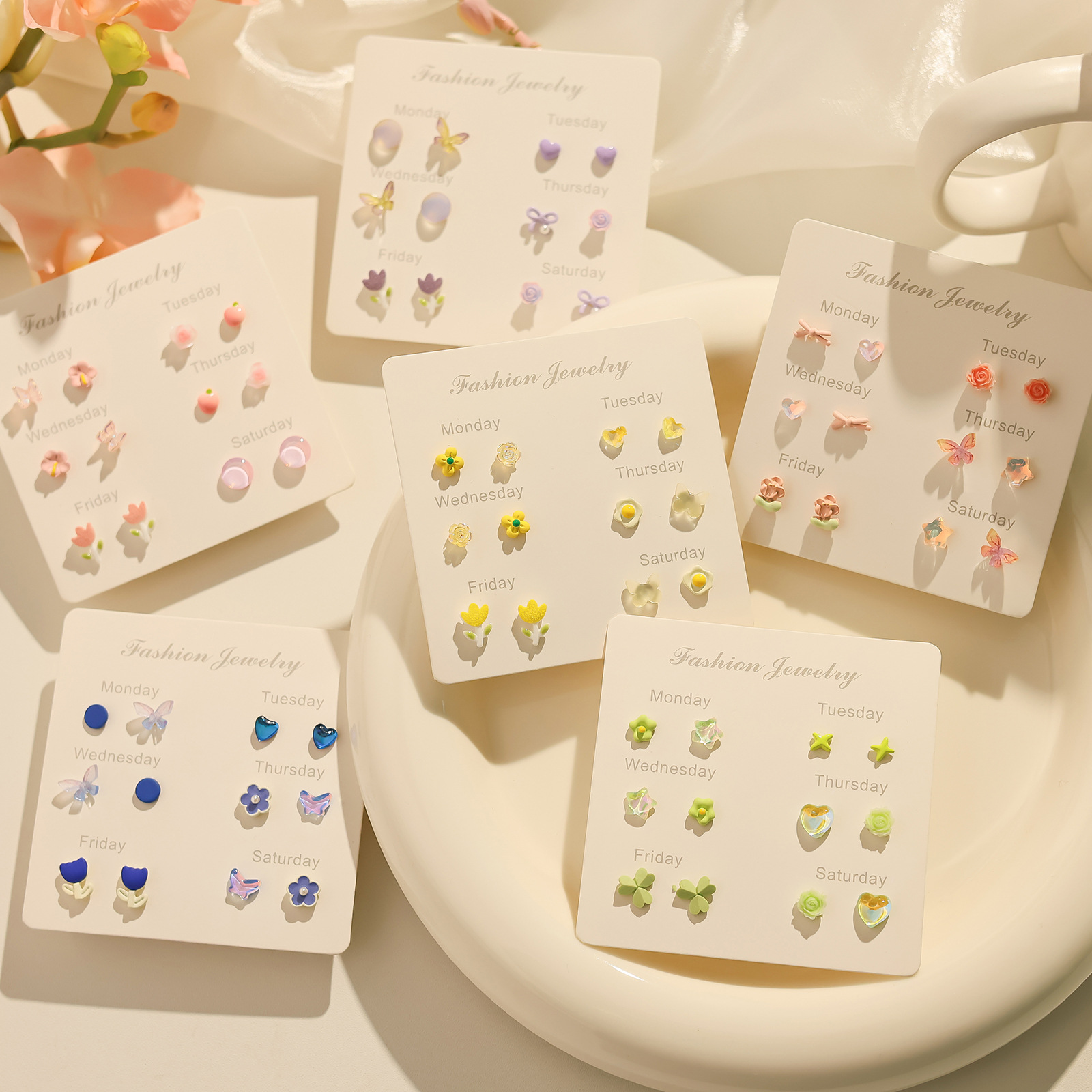 Spring new, fresh and cute one-week stud earrings set, girlish silver needle small, versatile daily earrings wholesale full figure