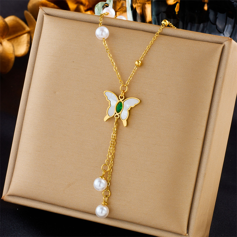 European and American fashion, retro, versatile, simple and high-end metal titanium steel tassel pearl butterfly pendant accessory necklace full figure